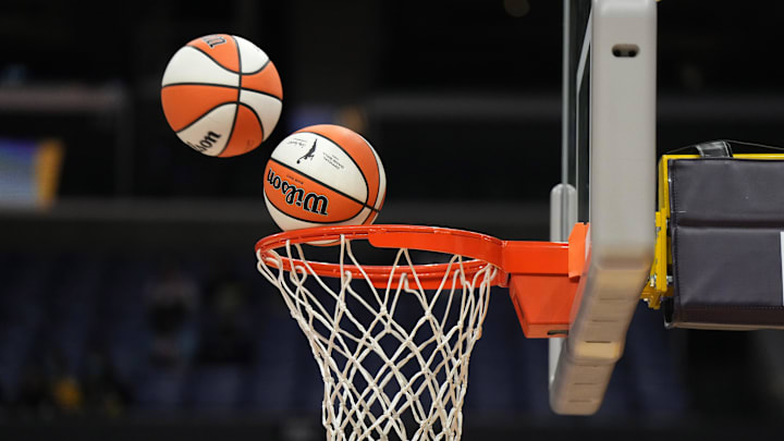 May 25, 2023; Los Angeles, California, USA; Wilson official basketballs with WNBA logo go through the net during the game between the LA Sparks and the Las Vegas Aces at Crypto.com Arena. Mandatory Credit: Kirby Lee-Imagn Images