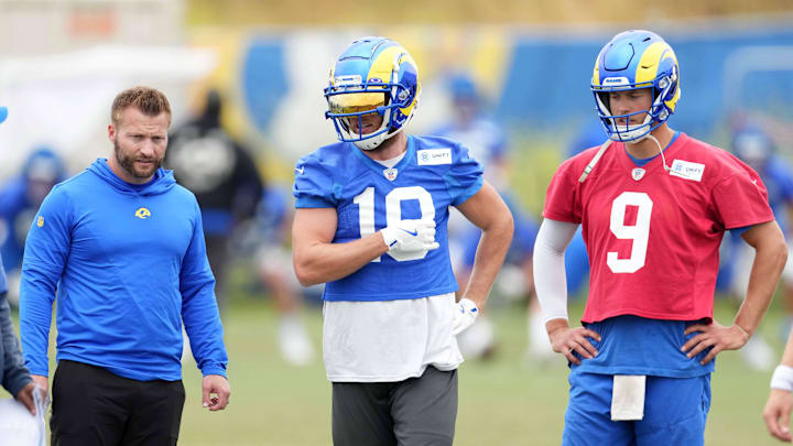 Jun 14, 2023; Thousand Oaks, CA, USA; Los Angeles Rams coach Sean McVay (left), receiver Cooper Kupp (10) and quarterback Matthew Stafford (9) during minicamp at Cal Lutheran University. Mandatory Credit: Kirby Lee-Imagn Images