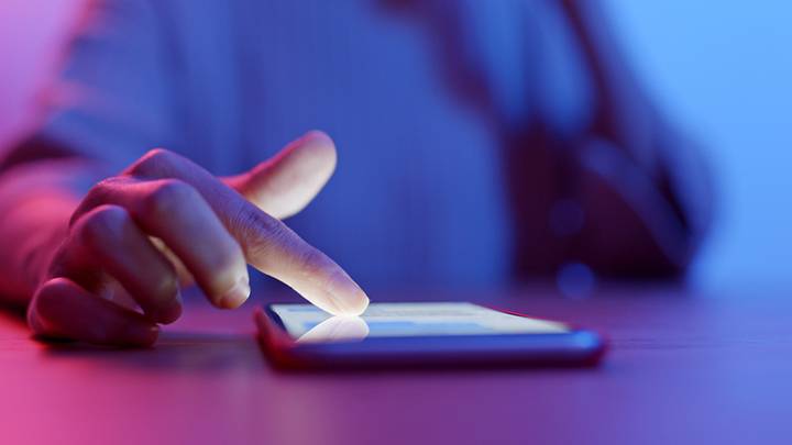 Person scrolling on phone