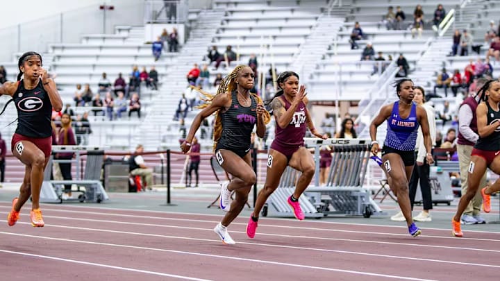 1st place finisher Iyana Gray in the middle of the 60m dash. 1st place finisher Iyana Gray in the middle of the 60m dash.