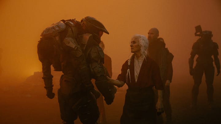 Pablo Schreiber as Master Chief and Olwen Fouéré as The Mother in Halo episode 1, Season 2, Streaming on Paramount+. Photo Credit: Adrienn Szabo/Paramount+