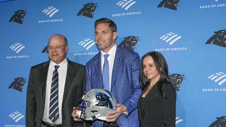 Feb 1, 2024; Charlotte, NC, USA; Carolina Panthers team owner David Tepper, general manager Dan Morgan and CAO Nicole Tepper during the introductory press conference for new general manager Dan Morgan and head coach Dave Canales at Bank of America Stadium. Mandatory Credit: Jim Dedmon-Imagn Images