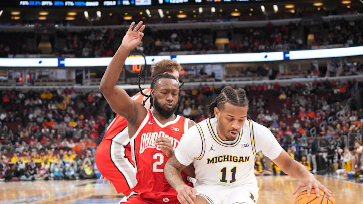 Mar 13, 2026; Chicago, IL, USA; Ohio State Buckeyes guard Bruce Thornton (2) defends Michigan Wolverines guard Roddy Gayle Jr. (11) during the first half at United Center. Mandatory Credit: David Banks-Imagn Images
