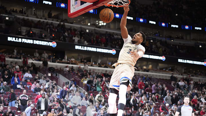 Giannis Antetokounmpo's late-game windmill slam capped off a 112-103 win for the Bucks.