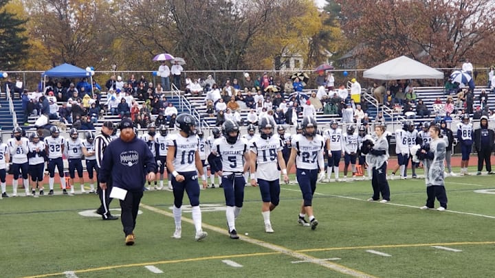 Portland Bulldogs walking up at the 2023 Maine high school football state championships. 