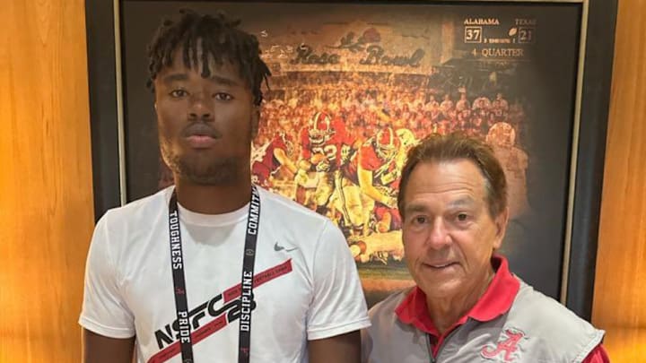 Five-star edge-rusher Javion Hilson with former Alabama coach Nick Saban