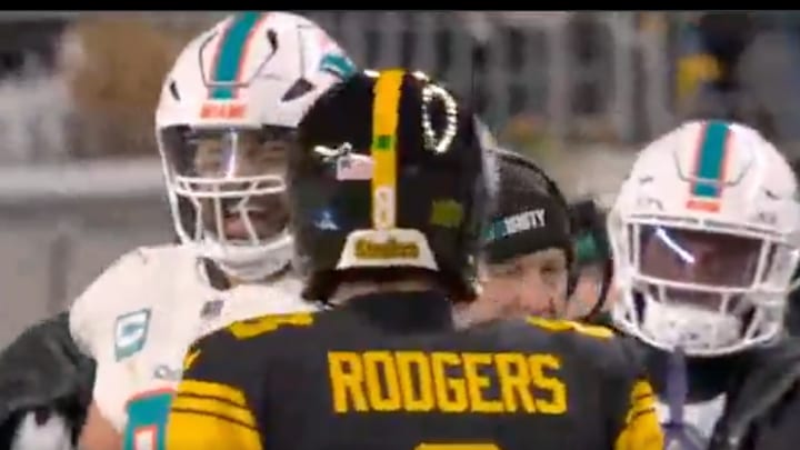 Aaron Rodgers has some fun with Dolphins players during key 'MNF' victory.