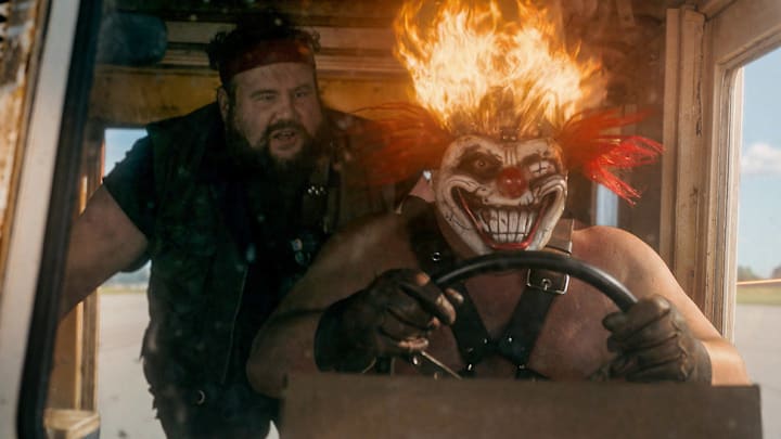 TWISTED METAL -- Episode 203 -- Pictured: (l-r) Mike Mitchell as Stu, Joe Seanoa as Sweet Tooth -- (Photo by: PEACOCK)