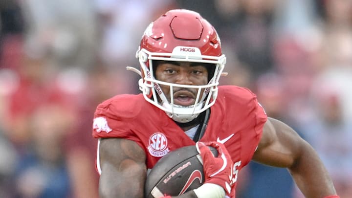 Arkansas Razorbacks running back Mike Washington running against the Texas A&M Aggies at Razorback Stadium in Fayetteville, Ark. Arkansas Razorbacks running back Mike Washington running against the Texas A&M Aggies at Razorback Stadium in Fayetteville, Ark.