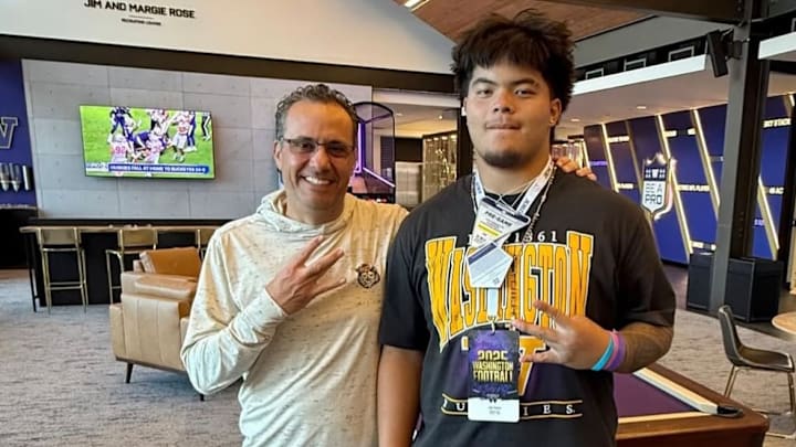 Jedd Fisch and Jon Ioane share a recruiting moment. 