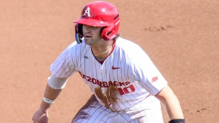 Arkansas Razorbacks' Peyton Stovall gets a lead off first base in a game against the Missouri Tigers on March 13, 2024, at Baum-Walker Stadium in Fayetteville, Ark.