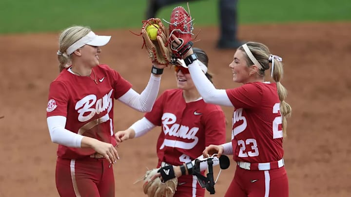 Alabama Softball Player Abby Duchscherer (10), Alabama Softball Player Jocelyn Briski (23), Alabama Softball Player Jena Young (4) celebrate against Ole Miss at Ole Miss Softball Stadium in Oxford, MS on Sunday, Mar 8, 2026.