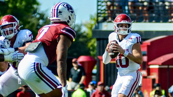 Oklahoma quarterback John Mateer drops back to pass against South Carolina. Oklahoma quarterback John Mateer drops back to pass against South Carolina.