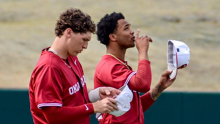 Oklahoma infielder Deiten Lachance, pitcher LJ Mercurius prepare for a game. Oklahoma infielder Deiten Lachance, pitcher LJ Mercurius prepare for a game.