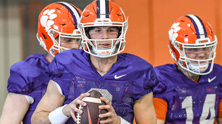 Clemson quarterback Cade Klubnik (2) warms up during Spring football practice at the Poe Indoor