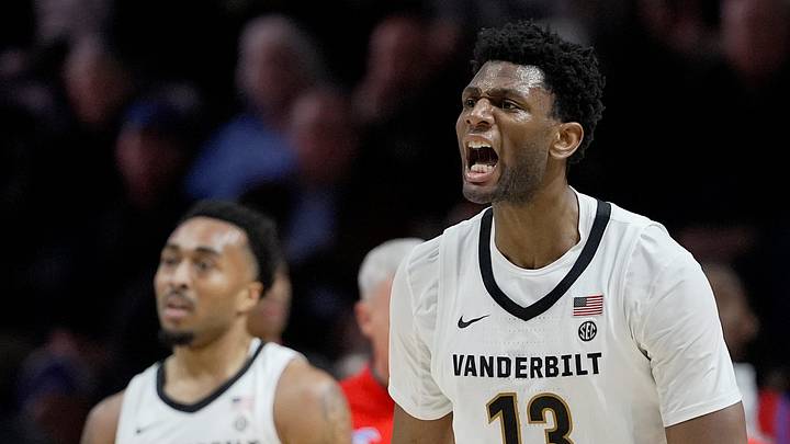 Vanderbilt forward Jalen Washington (13) reacts after making a defensive stop against SMU during the second half of an NCAA college basketball game Wednesday, Dec. 3, 2025, in Nashville, Tenn. Vanderbilt forward Jalen Washington (13) reacts after making a defensive stop against SMU during the second half of an NCAA college basketball game Wednesday, Dec. 3, 2025, in Nashville, Tenn.