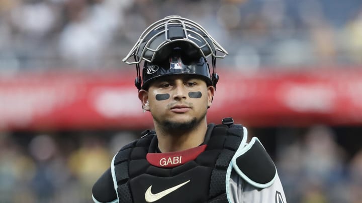 Aug 2, 2024; Pittsburgh, Pennsylvania, USA; Arizona Diamondbacks catcher Gabriel Moreno (14) looks on against the Pittsburgh Pirates during the fifth inning at PNC Park. Mandatory Credit: Charles LeClaire-USA TODAY Sports Aug 2, 2024; Pittsburgh, Pennsylvania, USA; Arizona Diamondbacks catcher Gabriel Moreno (14) looks on against the Pittsburgh Pirates during the fifth inning at PNC Park. Mandatory Credit: Charles LeClaire-USA TODAY Sports
