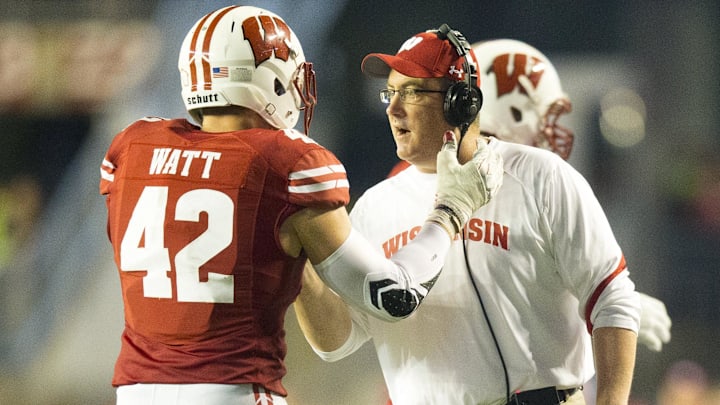 Former Wisconsin Badgers head coach Paul Chryst greets linebacker T.J. Watt. 