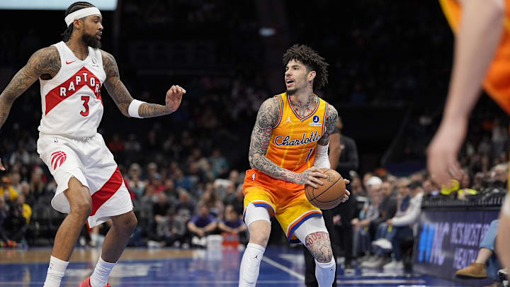 Nov 29, 2025; Charlotte, North Carolina, USA; Charlotte Hornets guard LaMelo Ball (1) looks to pass defended by Toronto Raptors forward Brandon Ingram (3) during the first quarter at Spectrum Center. Mandatory Credit: Jim Dedmon-Imagn Images Nov 29, 2025; Charlotte, North Carolina, USA; Charlotte Hornets guard LaMelo Ball (1) looks to pass defended by Toronto Raptors forward Brandon Ingram (3) during the first quarter at Spectrum Center. Mandatory Credit: Jim Dedmon-Imagn Images