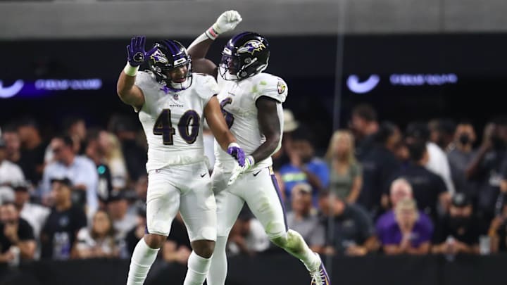 Sep 13, 2021; Paradise, Nevada, USA; Baltimore Ravens linebacker Malik Harrison (40) and linebacker Patrick Queen (6) celebrate a defensive play against the Las Vegas Raiders during the second half at Allegiant Stadium. Mandatory Credit: Mark J. Rebilas-Imagn Images