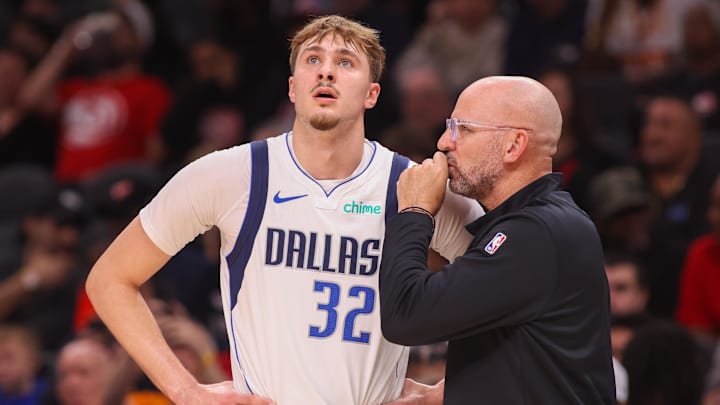 Mar 10, 2026; Atlanta, Georgia, USA; Dallas Mavericks forward Cooper Flagg (32) talks to head coach Jason Kidd against the Atlanta Hawks in the first quarter at State Farm Arena. Mandatory Credit: Brett Davis-Imagn Images
