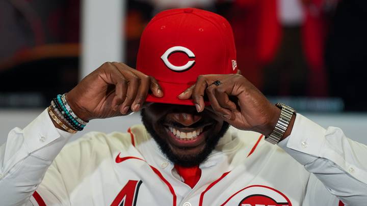 Brandon Phillips smiles as he adjusts his Reds hat after signing a one-day contract to retire a Cincinnati Red at Great American Ball Park. Mandatory Credit: Aaron Doster-Imagn Images Brandon Phillips smiles as he adjusts his Reds hat after signing a one-day contract to retire a Cincinnati Red at Great American Ball Park. Mandatory Credit: Aaron Doster-Imagn Images
