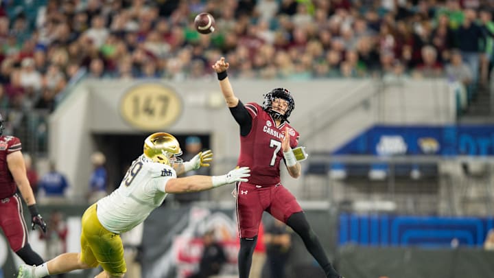 Dec 30, 2022; Jacksonville, FL, USA; South Carolina Gamecocks quarterback Spencer Rattler (7) throws