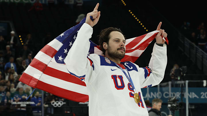 Feb 22, 2026; Milan, Italy; Auston Matthews #34 of Team United States celebrates after the game against Team Canada during the Milano Cortina 2026 Olympic Winter Games at Milano Santagiulia Ice Hockey Arena. Mandatory Credit: Geoff Burke-Imagn Images
