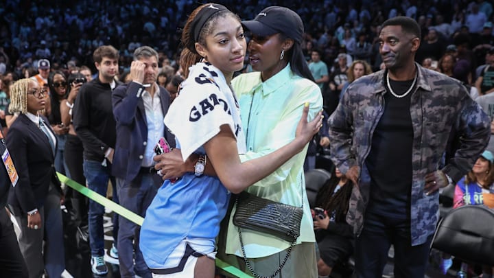 Jun 10, 2025; Brooklyn, New York, USA;  Chicago Sky forward Angel Reese (5) talks with former professional basketball player Lisa Leslie following the game against the New York Liberty at Barclays Center. Mandatory Credit: Wendell Cruz-Imagn Images
