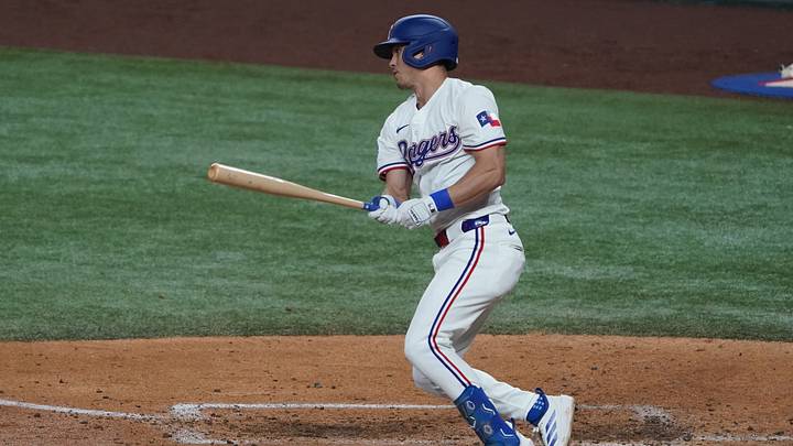 Aug 9, 2025; Arlington, Texas, USA; Texas Rangers outfielder Sam Haggerty (0) hits a single during the fifth inning against the Philadelphia Phillies at Globe Life Field. Mandatory Credit: Raymond Carlin III-Imagn Images Aug 9, 2025; Arlington, Texas, USA; Texas Rangers outfielder Sam Haggerty (0) hits a single during the fifth inning against the Philadelphia Phillies at Globe Life Field. Mandatory Credit: Raymond Carlin III-Imagn Images