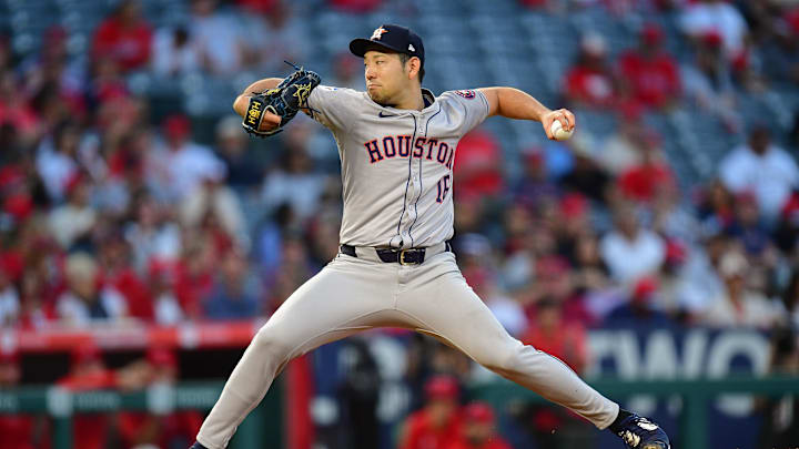 Sep 13, 2024; Anaheim, California, USA; Houston Astros pitcher Yusei Kikuchi (16) throws against the Los Angeles Angels during the first inning at Angel Stadium.