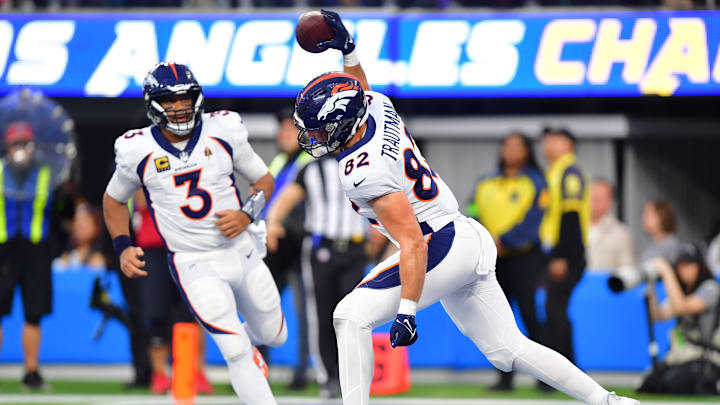 Denver Broncos tight end Adam Trautman (82) celebrates.