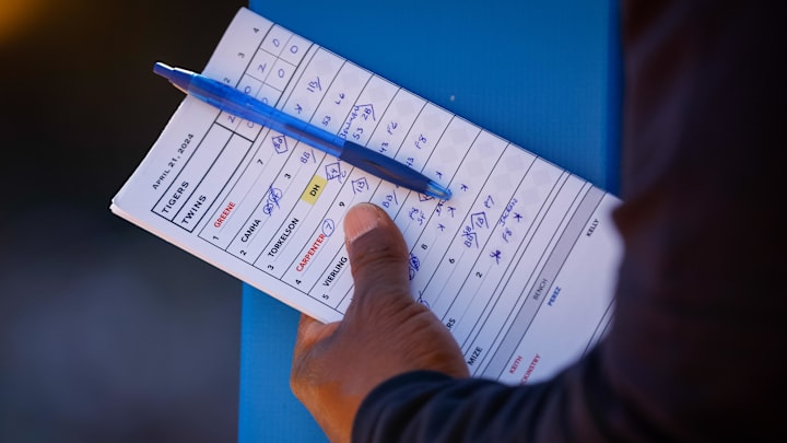 Apr 21, 2024; Minneapolis, Minnesota, USA; Line up hands of Detroit Tigers major league coach Gary Jones holds a lineup card in the eighth inning of the game with the Minnesota Twins at Target Field. Mandatory Credit: Bruce Kluckhohn-Imagn Images Apr 21, 2024; Minneapolis, Minnesota, USA; Line up hands of Detroit Tigers major league coach Gary Jones holds a lineup card in the eighth inning of the game with the Minnesota Twins at Target Field. Mandatory Credit: Bruce Kluckhohn-Imagn Images