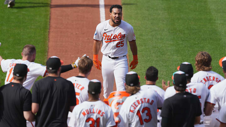 Sep 19, 2024; Baltimore, Maryland, USA; Baltimore Orioles designated hitter Anthony Santander (25) is greeted by teammates following his game-winning two-run home run in the ninth inning against the San Francisco Giants at Oriole Park at Camden Yards. Sep 19, 2024; Baltimore, Maryland, USA; Baltimore Orioles designated hitter Anthony Santander (25) is greeted by teammates following his game-winning two-run home run in the ninth inning against the San Francisco Giants at Oriole Park at Camden Yards.