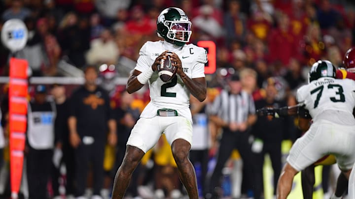 Sep 20, 2025; Los Angeles, California, USA; Michigan State Spartans quarterback Aidan Chiles (2) drops back to pass against the Southern California Trojans during the second half at the Los Angeles Memorial Coliseum. Mandatory Credit: Gary A. Vasquez-Imagn Images