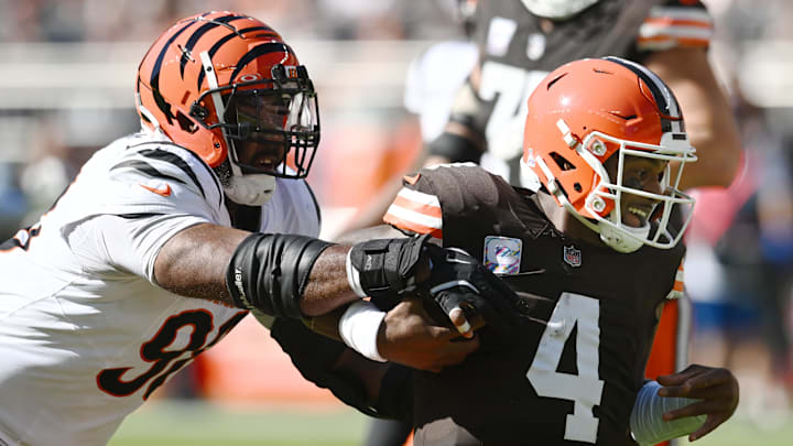 Oct 20, 2024; Cleveland, Ohio, USA; Cincinnati Bengals defensive tackle Sheldon Rankins (98) tackles Cleveland Browns quarterback Deshaun Watson (4) during the first half at Huntington Bank Field. Mandatory Credit: Ken Blaze-Imagn Images