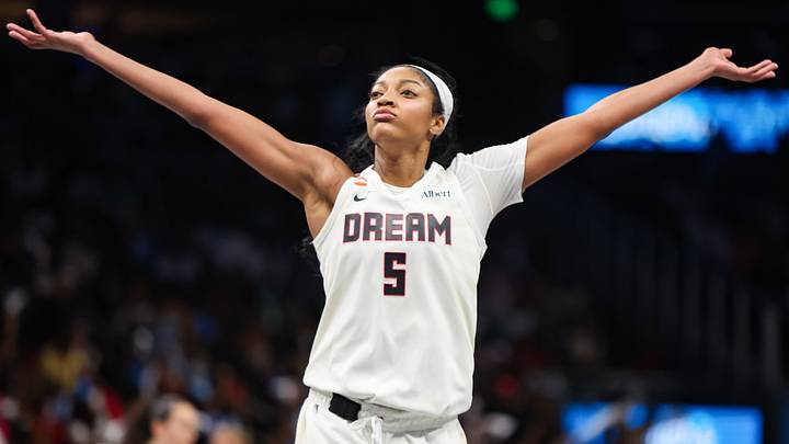 Oct 4, 2026; Atlanta, Georgia, USA; Atlanta Dream forward Angel Reese (5) reacts after a basket against the New York Liberty in the third quarter during game one of the second round for the 2026 WNBA Playoffs at State Farm Arena. Mandatory Credit: Brett Davis-Imagn Images
