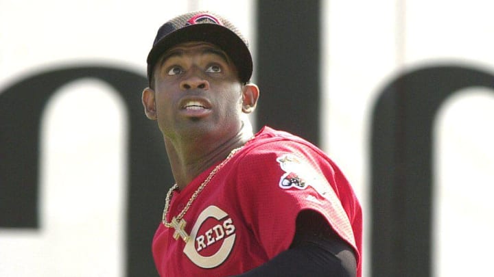 Text: 2001.02.21.08.01 REDS SPORTS NIKON DIGITAL IMAGE : The Cincinnati Reds' Deion Sanders watches a fly ball during Spring Training practice Wednesday February 21, 2001 in Sarasota Florida. Jeff Swinger/Cincinnati Enquirer jsTitle No Title Text: 2001.02.21.08.01 REDS SPORTS NIKON DIGITAL IMAGE : The Cincinnati Reds' Deion Sanders watches a fly ball during Spring Training practice Wednesday February 21, 2001 in Sarasota Florida. Jeff Swinger/Cincinnati Enquirer jsTitle No Title