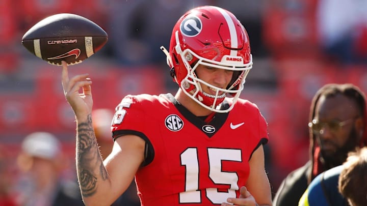 Georgia quarterback Carson Beck (15) warms up Nov. 4, 2023, before the start of a game against Missouri.