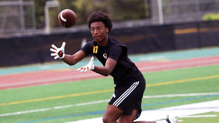 Reynolds junior receiver/defensive back Elliott Bruce makes a catch at Saturday’s The Chosen 1Hundred event at Jesuit High School.