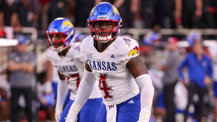 Kansas' Trey Lathan scans the Texas Tech offense during a Big 12 Conference football game, Saturday, Oct. 11, 2025, at Jones AT&T Stadium in Lubbock. Kansas' Trey Lathan scans the Texas Tech offense during a Big 12 Conference football game, Saturday, Oct. 11, 2025, at Jones AT&T Stadium in Lubbock.