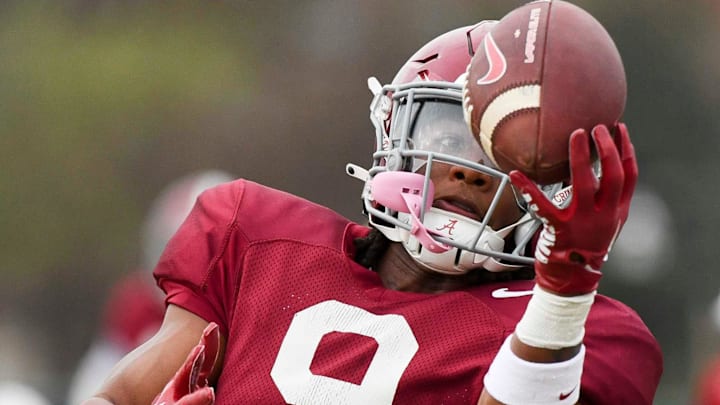 Mar 21, 2024; Tuscaloosa, Alabama, USA; Defensive back Jaylen Mbakwe tries to one-hand catch a ball during practice at the University Alabama Thursday.