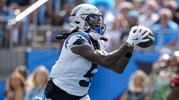 Sep 29, 2024; Charlotte, North Carolina, USA; Carolina Panthers wide receiver Diontae Johnson (5) makes a catch for a score in the end zone against the Cincinnati Bengals during the third quarter at Bank of America Stadium. Mandatory Credit: Jim Dedmon-Imagn Images