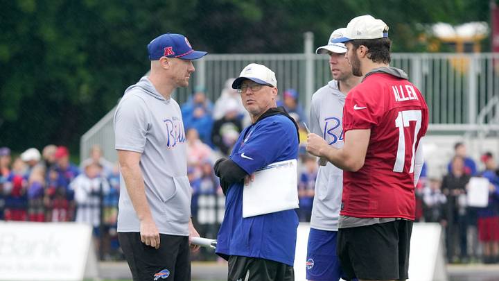 Bills head coach Joe Brady, offensive coordinator Pete Carmichael and quarterback Josh Allen talk after practice at Bills Training Camp at St. John Fisher University on July 29, 2026 in Pittsford Bills head coach Joe Brady, offensive coordinator Pete Carmichael and quarterback Josh Allen talk after practice at Bills Training Camp at St. John Fisher University on July 29, 2026 in Pittsford