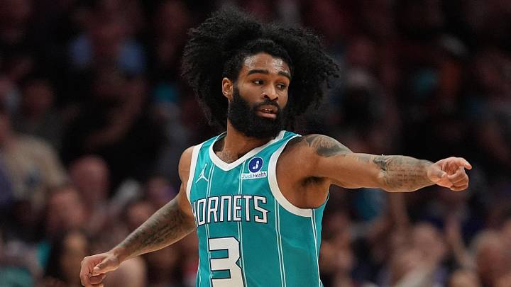 Apr 2, 2026; Charlotte, North Carolina, USA; Charlotte Hornets guard Coby White (3) acknowledges an assist from guard/forward Kon Knueppel (7) during the second quarter against the Phoenix Suns at Spectrum Center. Mandatory Credit: Jim Dedmon-Imagn Images