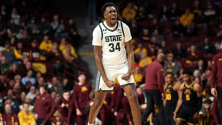 Dec 4, 2024; Minneapolis, Minnesota, USA; Michigan State Spartans forward Xavier Booker (34) celebrates his three-point basket against the Minnesota Golden Gophers during the second half at Williams Arena. Mandatory Credit: Matt Krohn-Imagn Images