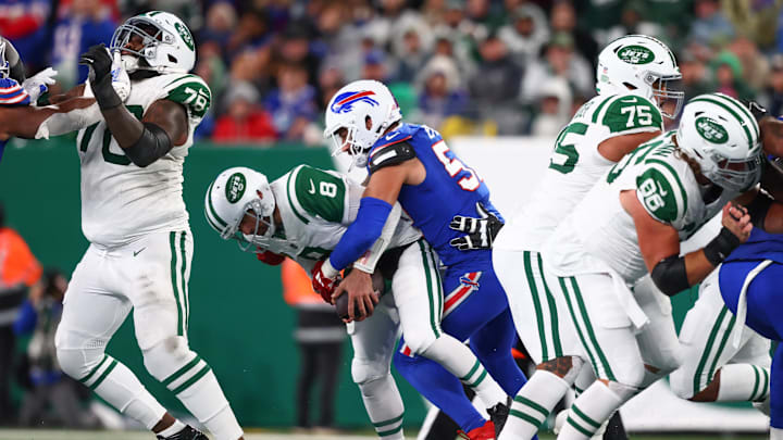 New York Jets quarterback Aaron Rodgers is sacked by Buffalo Bills defensive end AJ Epenesa.