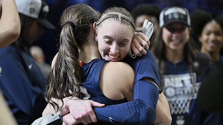 Apr 1, 2024; Portland, OR, USA; UConn Huskies guard Paige Bueckers (5) celebrates with guard Nika Muhl (10) after beating the USC Trojans in the finals of the Portland Regional of the NCAA Tournament at the Moda Center. Mandatory Credit: Troy Wayrynen-Imagn Images Apr 1, 2024; Portland, OR, USA; UConn Huskies guard Paige Bueckers (5) celebrates with guard Nika Muhl (10) after beating the USC Trojans in the finals of the Portland Regional of the NCAA Tournament at the Moda Center. Mandatory Credit: Troy Wayrynen-Imagn Images