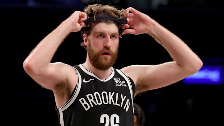 Mar 28, 2025; Brooklyn, New York, USA; Brooklyn Nets forward Drew Timme (26) adjusts his headband during the fourth quarter against the Los Angeles Clippers at Barclays Center. Mandatory Credit: Brad Penner-Imagn Images