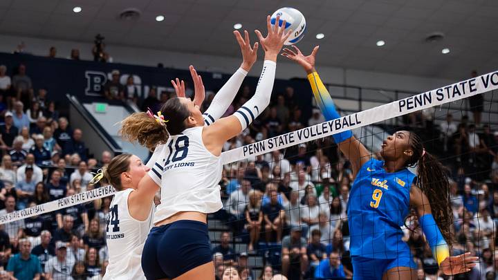 Penn State's Kennedy Martin (18) blocks a hit from UCLA's Cheridyn Leverette (9) during a Big Ten volleyball match on Sunday, Sept. 28, 2025, in State College.